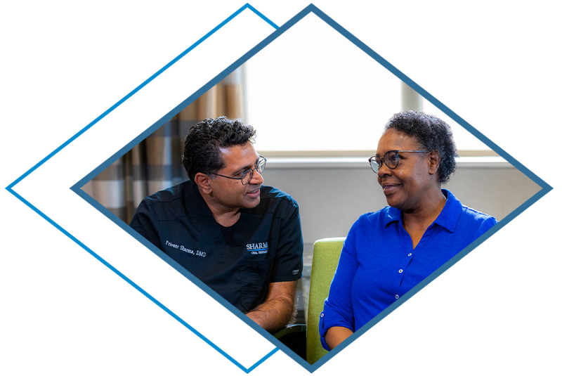 sharma with lorrie hashing out implant details