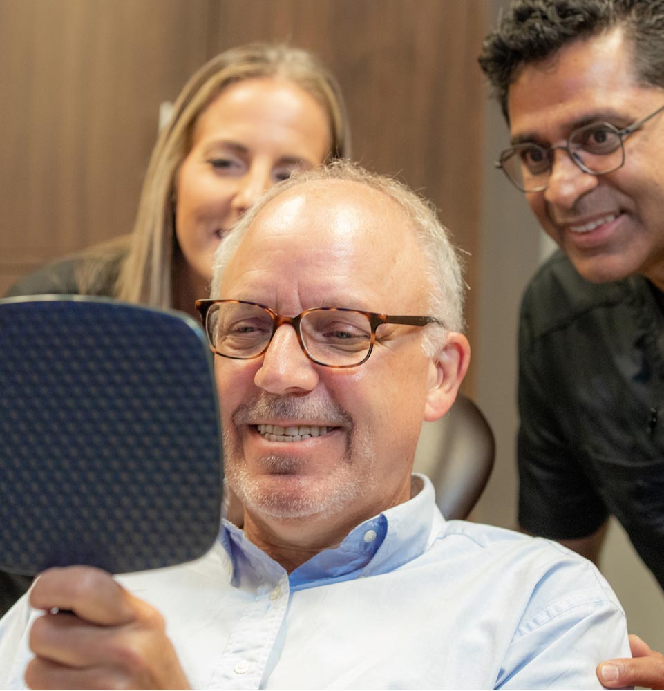 Oral Surgery Patient Seeing Final Results